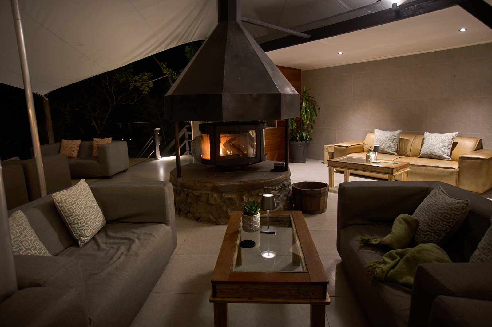 Sundowners and a communal fire at the Boma in the evening