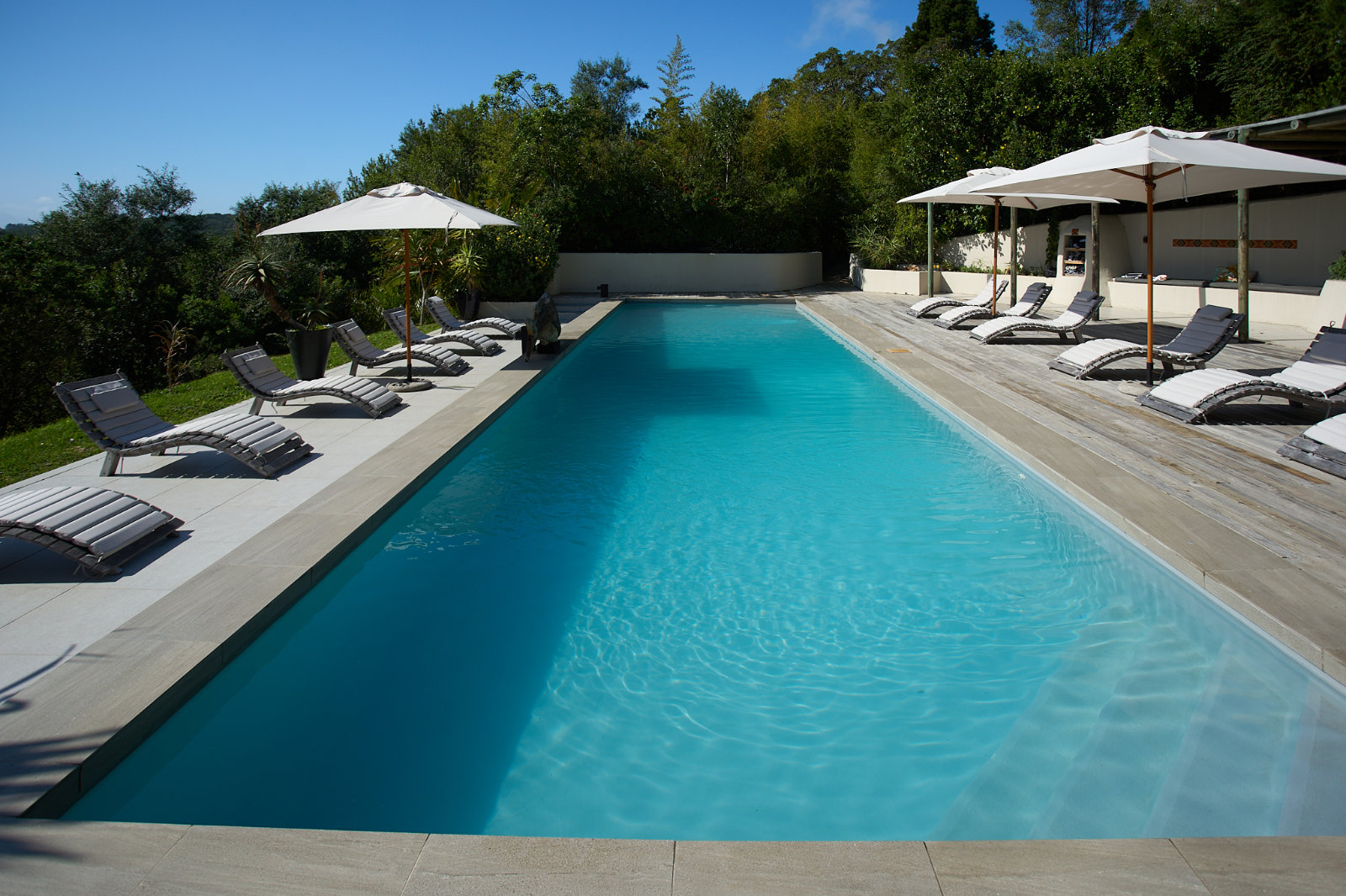 Pool deck loungers catching the afternoon light